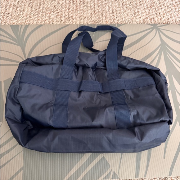 Uniqlo Collapsible Bag Navy NWOT - Picture 2 of 9